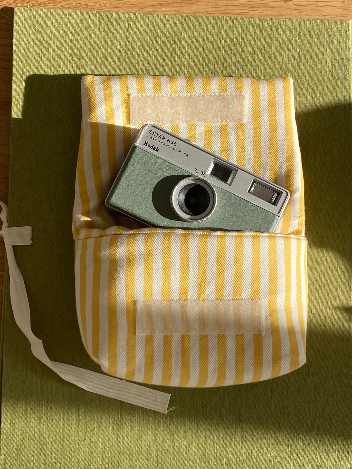 YELLOW STRIPED CAMERA POUCH